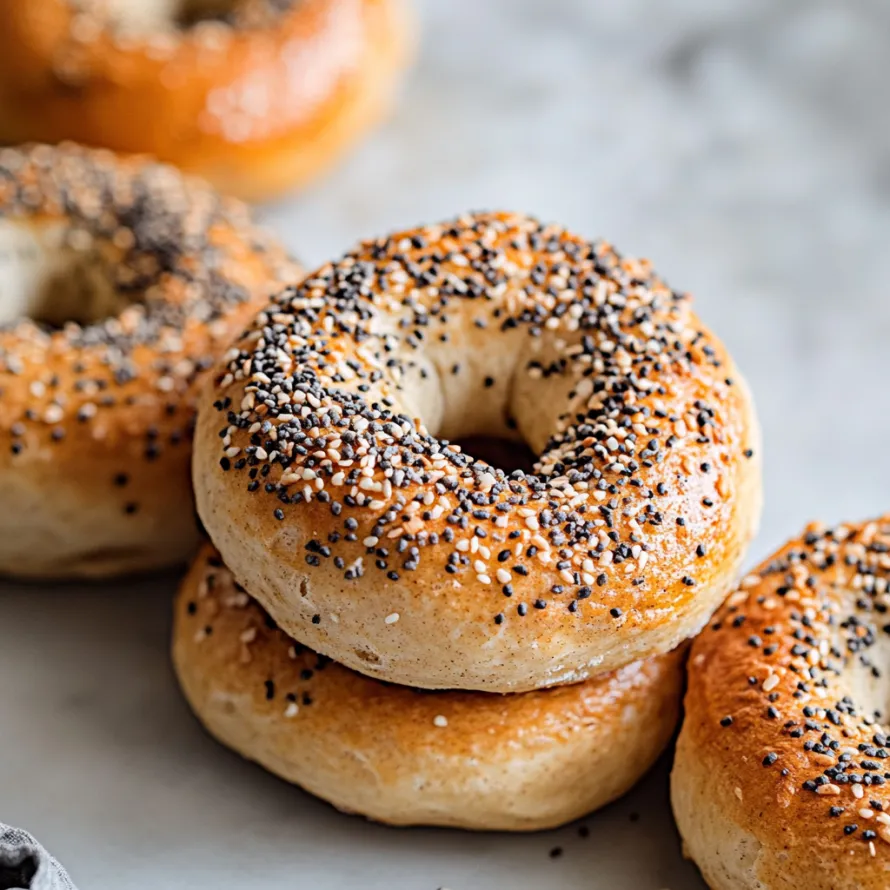 A stack of poppy seed bagels.