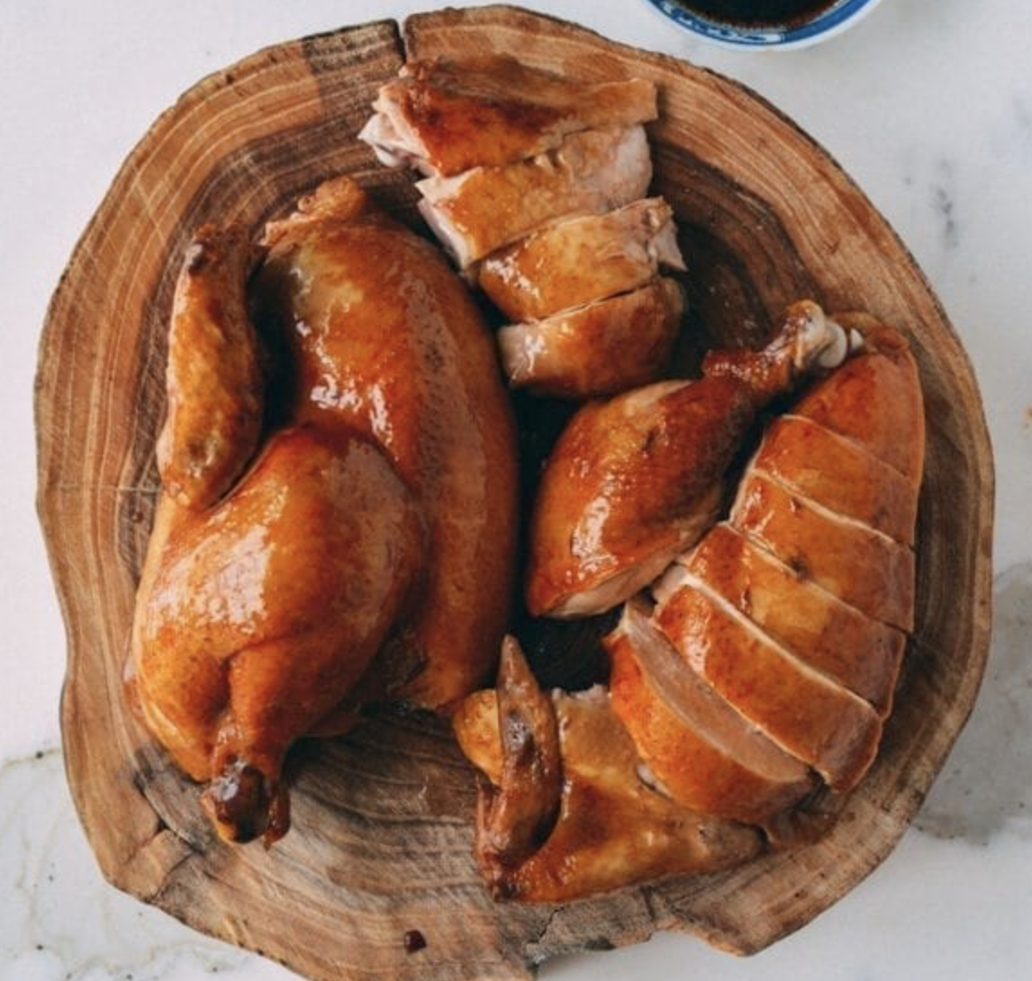 A plate of cooked chicken.